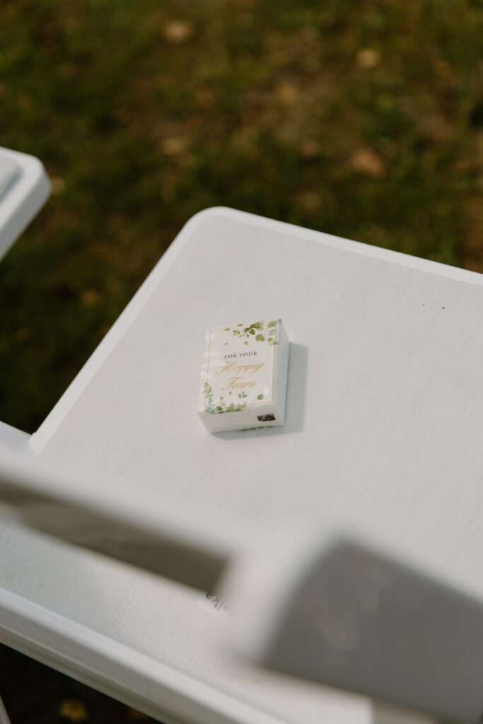 Ceremony chair with Happy Tears Tissues sitting on the chair